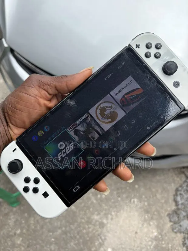 Nintendo Switch Oled With Games Installed Available at a Low Price. · Photo 1