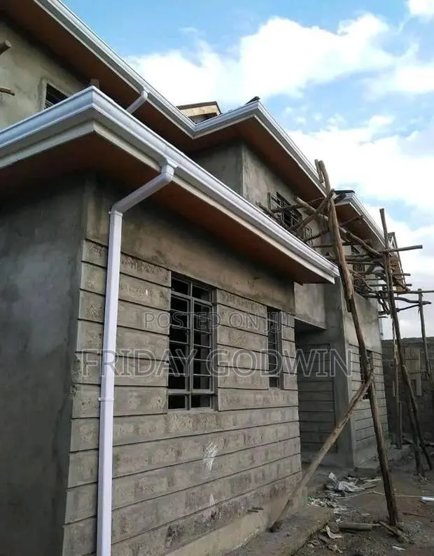 Installation of Rain Gutter and Downspout · Photo 1