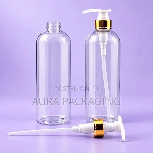 Clear Lotion and Shampoo Bottles With Gold Pump · Photo 1