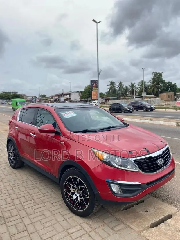 Kia Sportage 2015 Red · Photo 1
