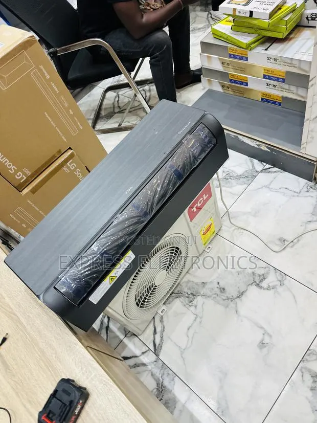 Hot Deals on TCL 1.5hp Split Inverter Dark Grey. · Photo 1