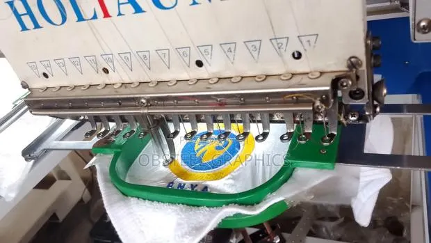 Embroidery on Towels, Shirts, Lacoste, Cap, Sash, Scarf, Etc · Photo 1