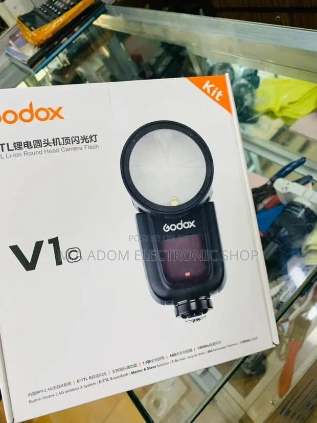 Authentic Godox V1 Round Head Camera Flash for Canon. · Photo 1