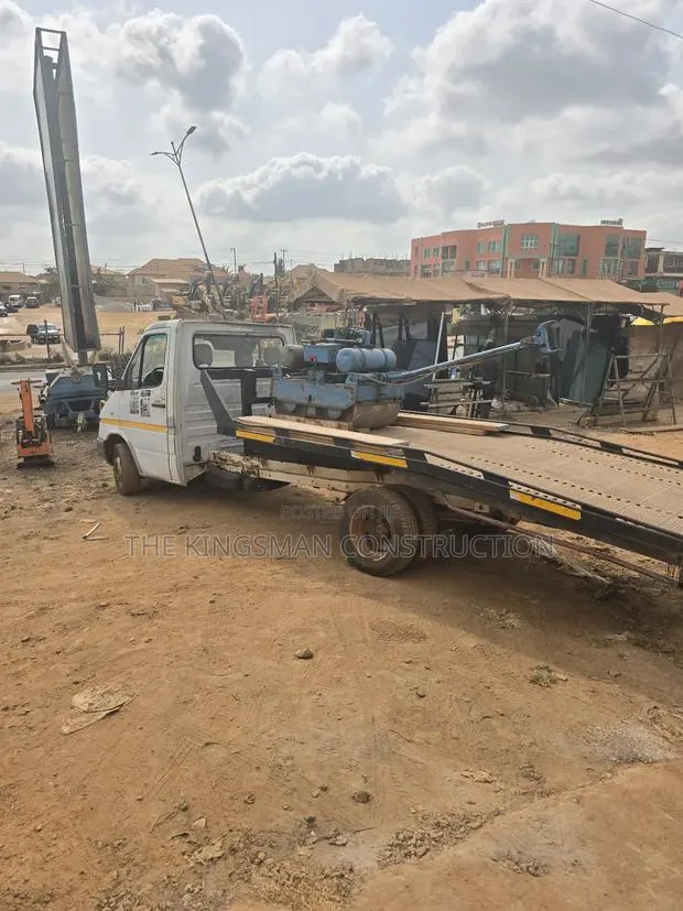 Compactor/Roller/Backhoe Loader · Photo 2