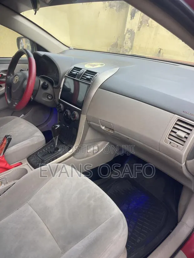 Toyota Corolla 2010 Red · Photo 1