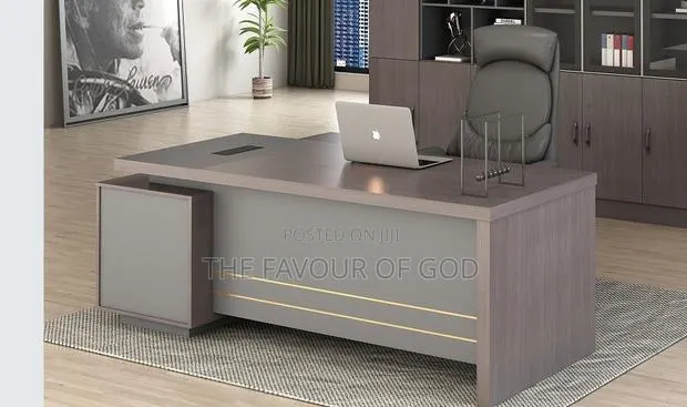 A Solid Wooden Lshaped Office Table 1.6meters · Photo 1