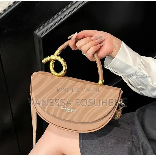 Women’s Beige Leather Half Moon Shoulder Handbag With Gold Detail · Photo 1