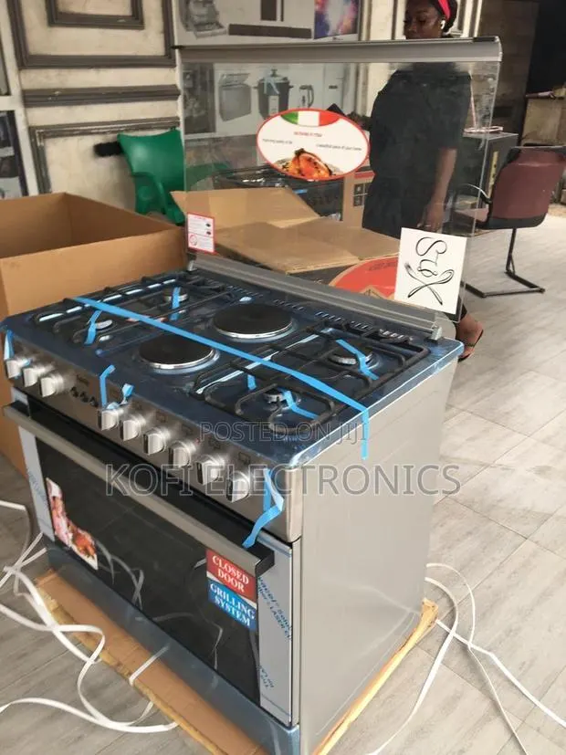 Ferre 4 Gas + 2 Electric Cooker Complete Cooking Convenience · Photo 1