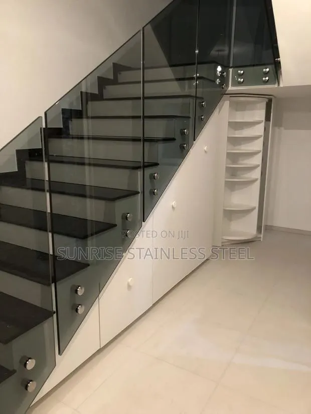 Stainless Frameless Staircase Design · Photo 1