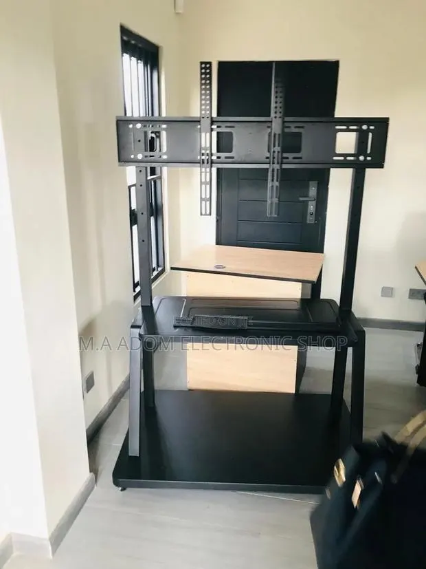 Heavy-Duty Mobile TV Stand - The Perfect TV Companion · Photo 1