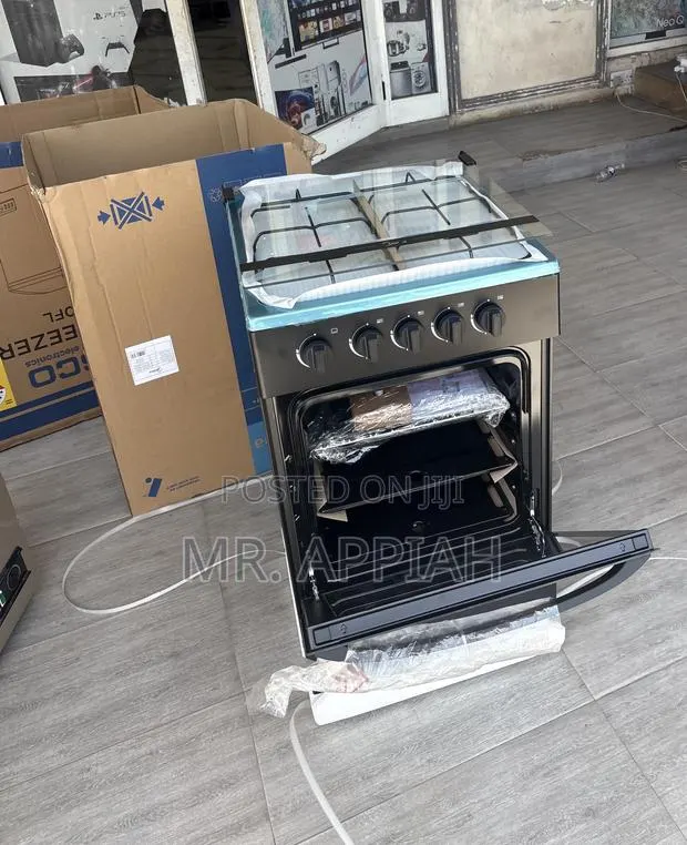 Efficient and Reliable Midea 4 Gas Burner With Grill(Glass Lid) Black · Photo 1
