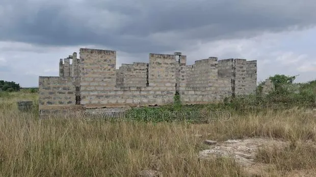 Half Plot With Uncompleted Building at Oyibi Appolonia City · Photo 1