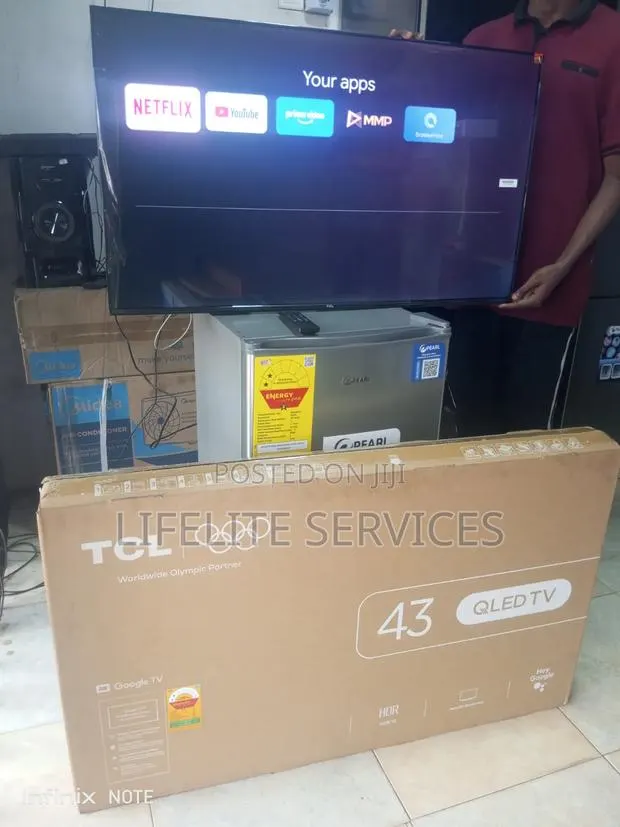 QLed TV 43" - TCL Smart Android #Browse More Movies · Photo 1