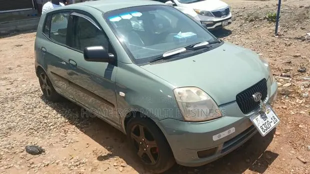 Kia Picanto 1.1 2010 Gray · Photo 1