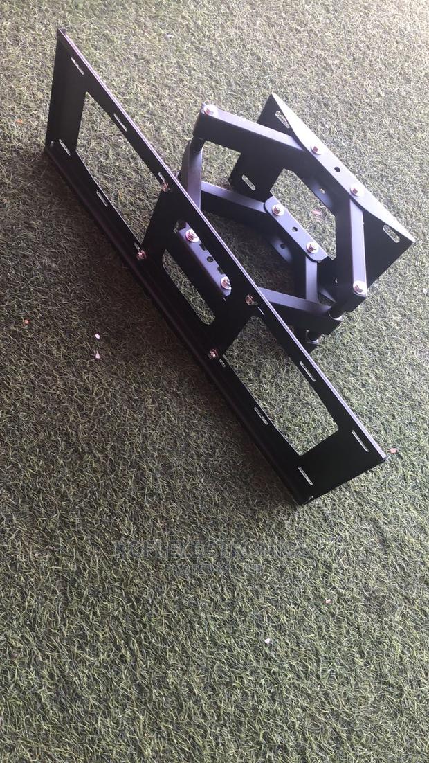 Full Motion TV Wall Mount for 32-85" TVS · Photo 1