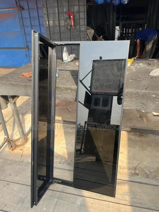 Frameless Casment Windows With Sliding Net · Photo 1