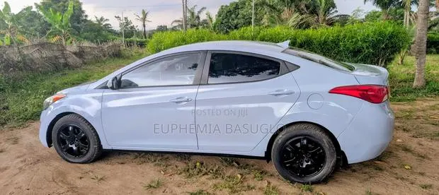 Hyundai Elantra GLS Sedan FWD (1.8L 4cyl 6A) 2013 Gray · Photo 1