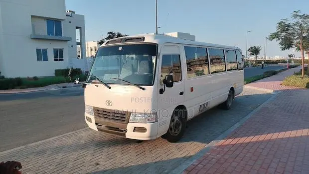 Toyota Coaster 2012 White · Photo 1