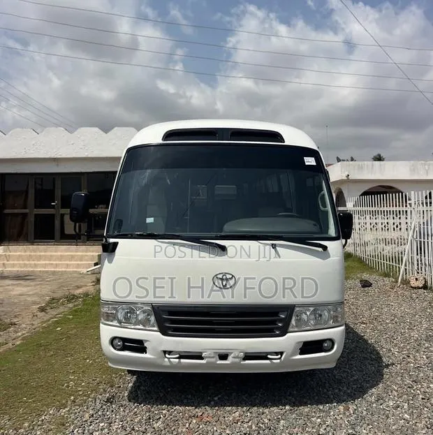 Toyota Coaster 2007 White · Photo 1