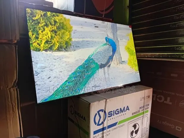 Feel Every Scene With TCL 65inches Smart Tv · Photo 1