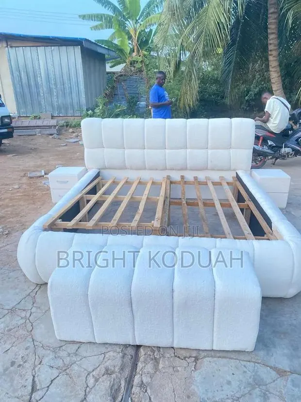 Well Arrange King Size Bed Frame With a Side Drawers and Ottoman · Photo 1