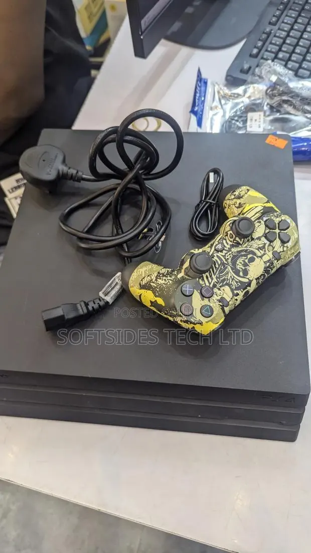 Clean Home Used PlayStation 4 Pro or PS4 PRO With 14 Games Install. · Photo 1