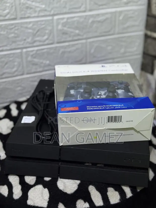 New Ps4 With Fc 26 and Other Games Plus Controller and Accessories · Photo 1