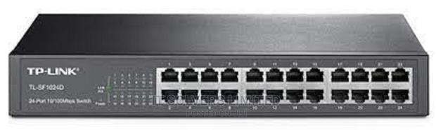 TP-LINK TL-SF1024D 24 Port Desktop Switch · Photo 1