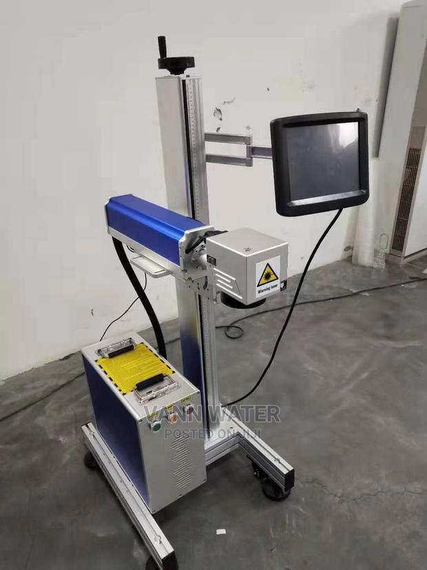 Laser Coding Machine. · Photo 1