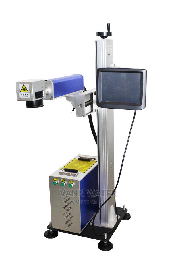 Laser Coding Machine. · Photo 3