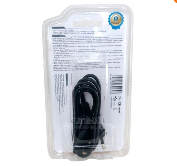 Beston Charger With 4 Batteries ( BST-C903W ) · Photo 2
