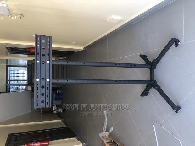Tv Stand W/Flexible Mount Bracket Fit Most Flatscreen 32-65 · Photo 1