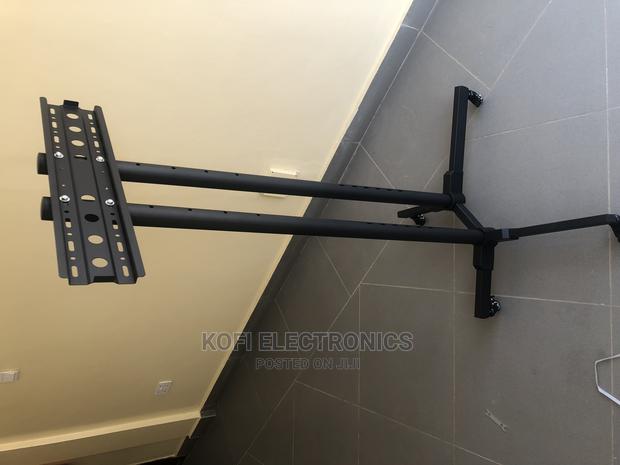 Mobile TV Stand With Mount(Equipped With 4 Brake Castors) · Photo 1