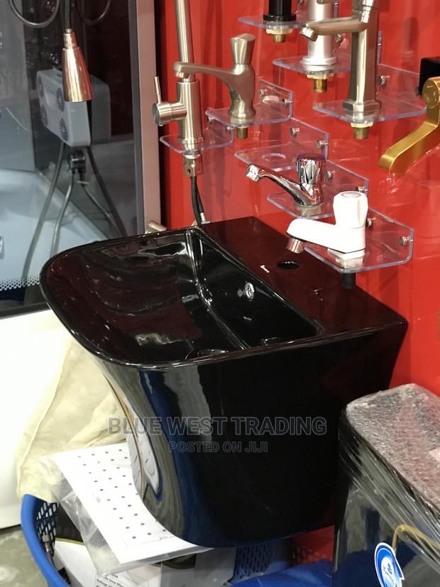 Wall Hung Basin - Black and Gold Basin · Photo 1