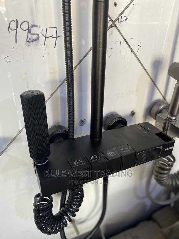 Black Shower With Temperature Indicator - Piano Style Shower · Photo 5