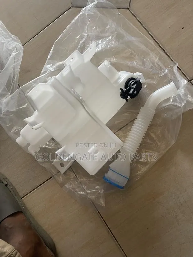 Mazda CX-5 2014 to 2022 Wiper Bottle · Photo 1