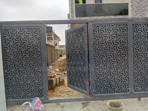 16ft Main Gate With Small Door in It · Photo 1
