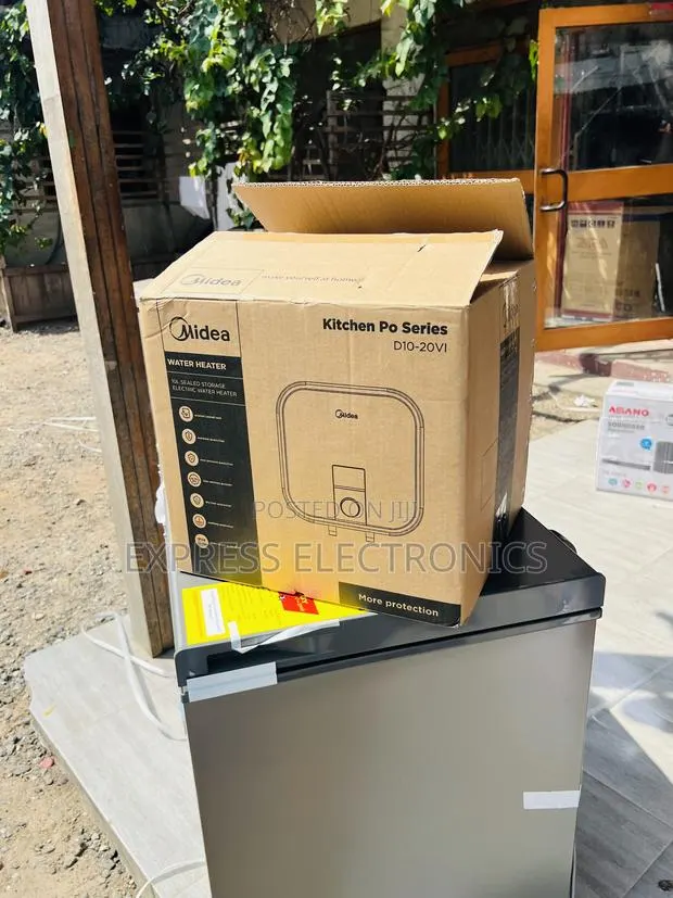 Ultra Modern White Water Heater Midea 10l • · Photo 1