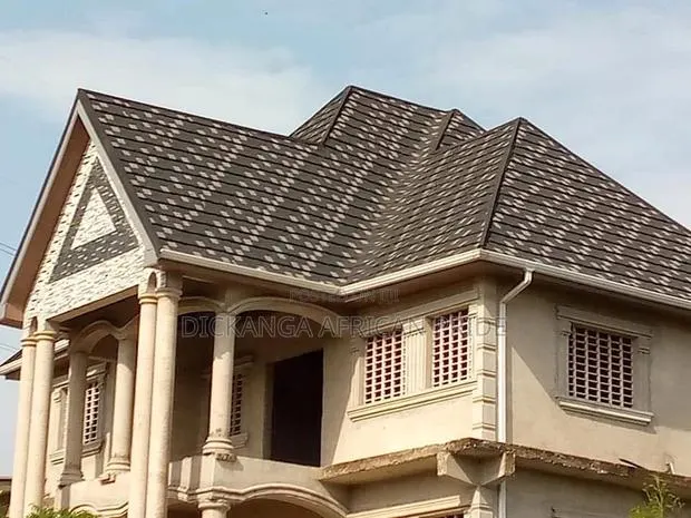 Invest Once, Enjoy 50 Years Of Roofing Confidence. · Photo 1