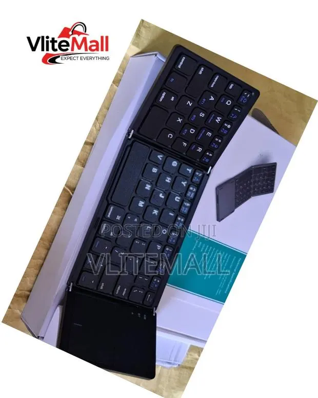 B033 Foldable Bluetooth Keyboard With Touchpad. · Photo 1