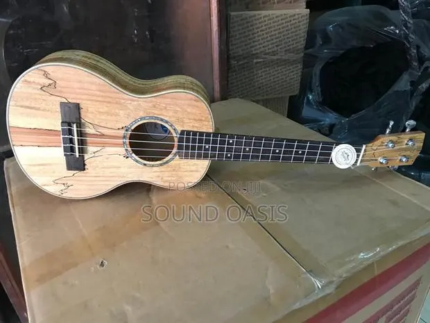 Acl Ukulele Guitar · Photo 1