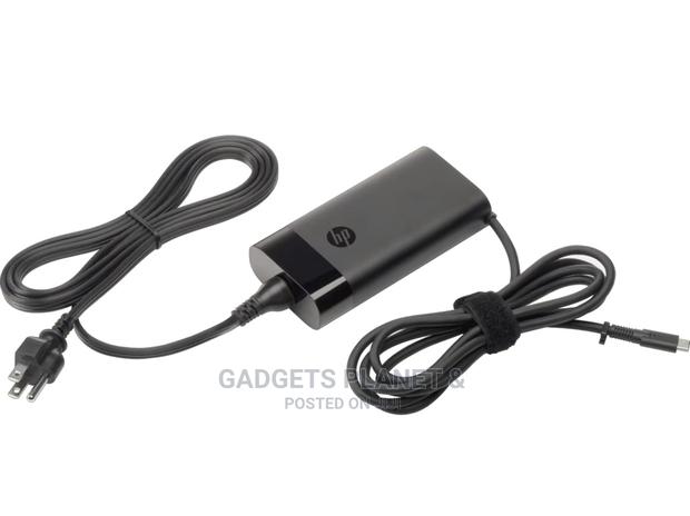 HP 90W USB-C Power Adapter + Free AC Cord · Photo 1