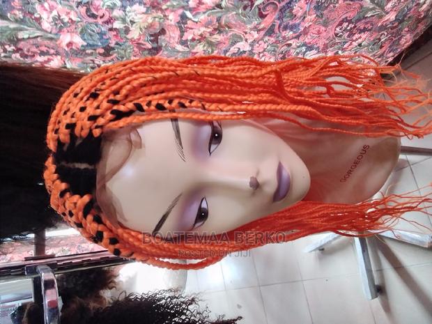 Orange Coloured Rasta Braided Wig · Photo 2