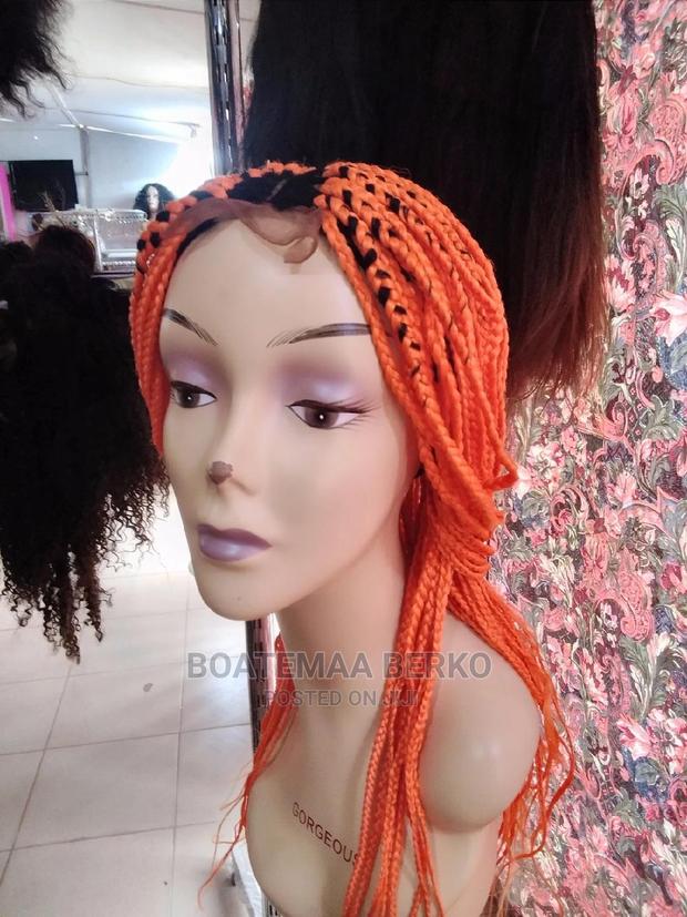 Orange Coloured Rasta Braided Wig · Photo 1