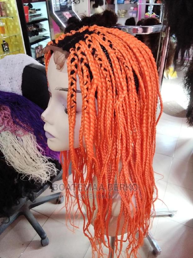 Orange Coloured Rasta Braided Wig · Photo 3