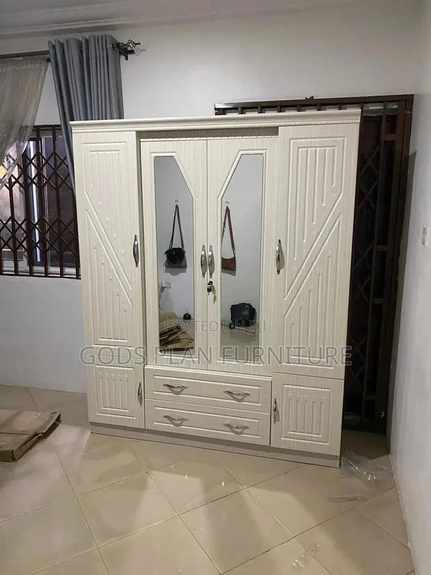 Four Doors Wooden Wardrobe · Photo 1