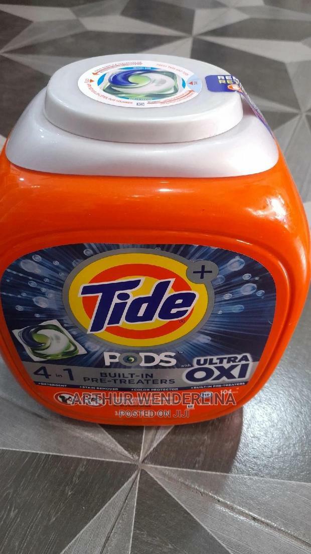 Tide Pods Ultra Oxi Laundry Detergent Fight Tough Stain · Photo 7