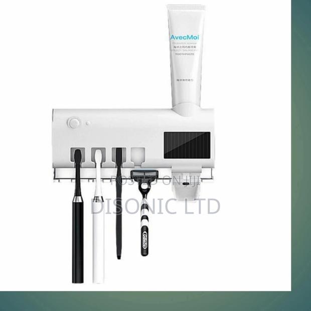 Solar Electric Sterilizing Brush Toothpaste Dispenzer · Photo 2