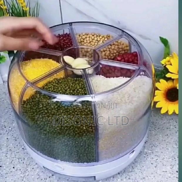 Rotating Rice Dispenser Or Cereal Dispenser · Photo 1