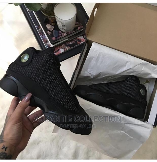 Air Jordan Retro 13 Black Cat · Photo 3